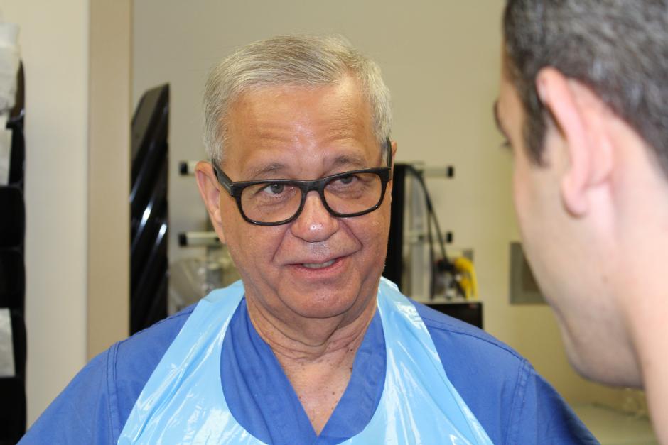 Dr. Joseph Thornton speaks to a resident physician
